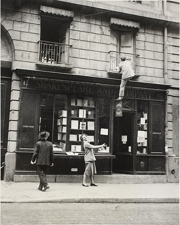 George Antheil climbing into his apartment in Paris