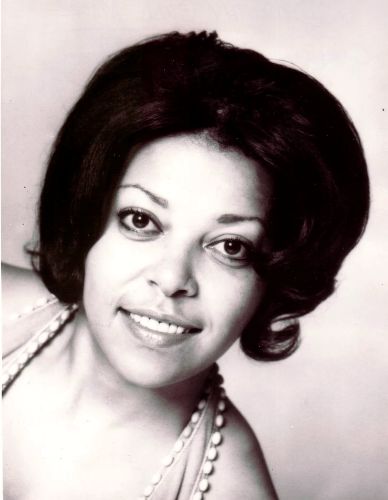 Black and white headshot of Moore